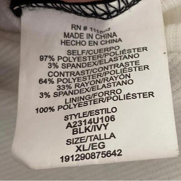 Chic Black and Ivory Jumpsuit with Bow Detail - Size XL - Picture 3 of 3